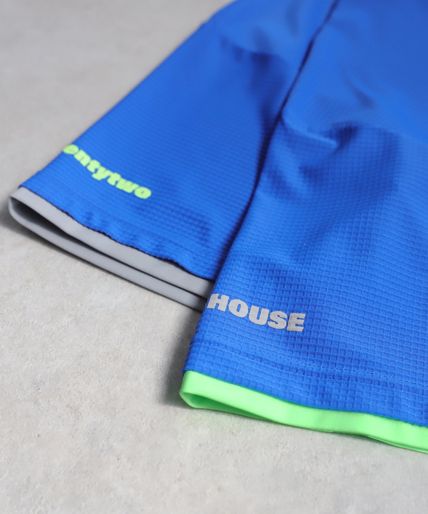 ANTIQUA GOLF×STCH Mesh-Like Color Scheme Tops Men's