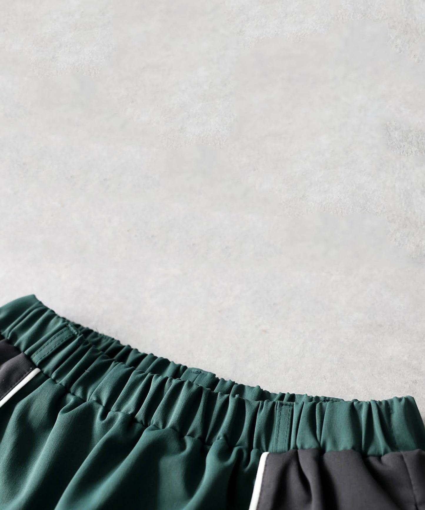 ANTIQUA GOLF×STCH Color-Blocked Piping Mini Skirt Ladies