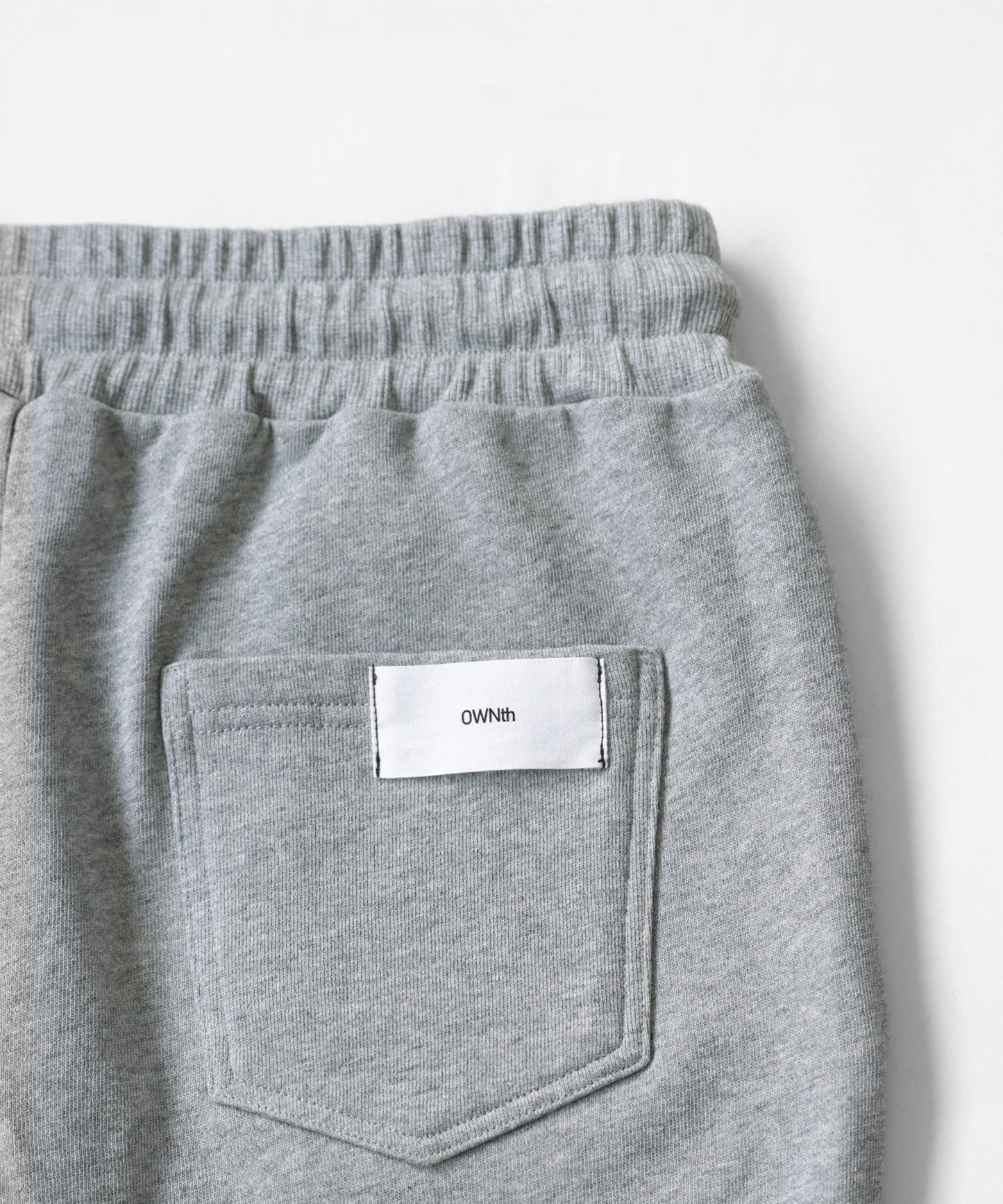 Shrink chip code design "OWNth" logo sweat pants Unisex