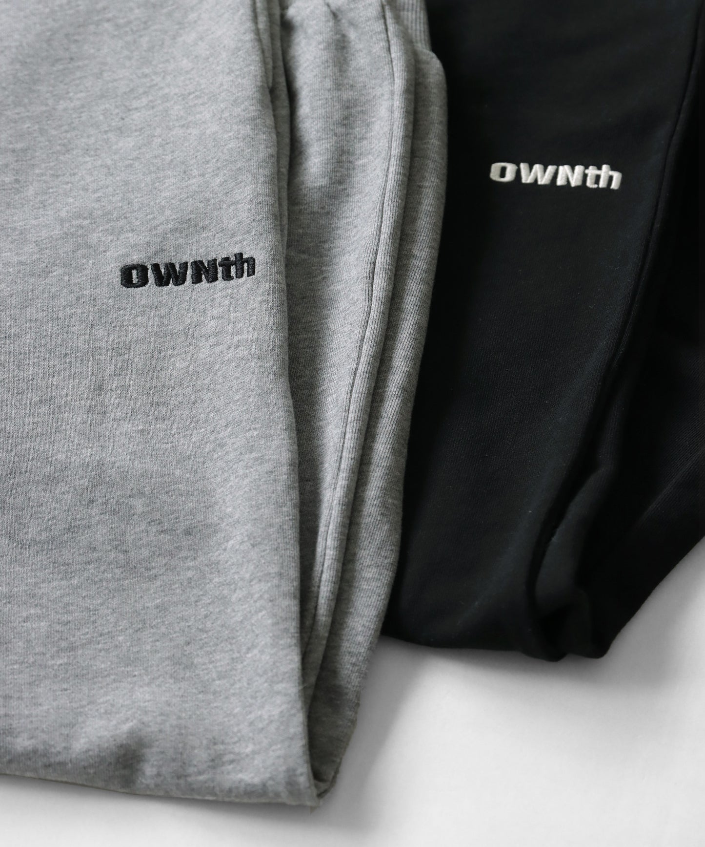 Shrink chip code design "OWNth" logo sweat pants Unisex