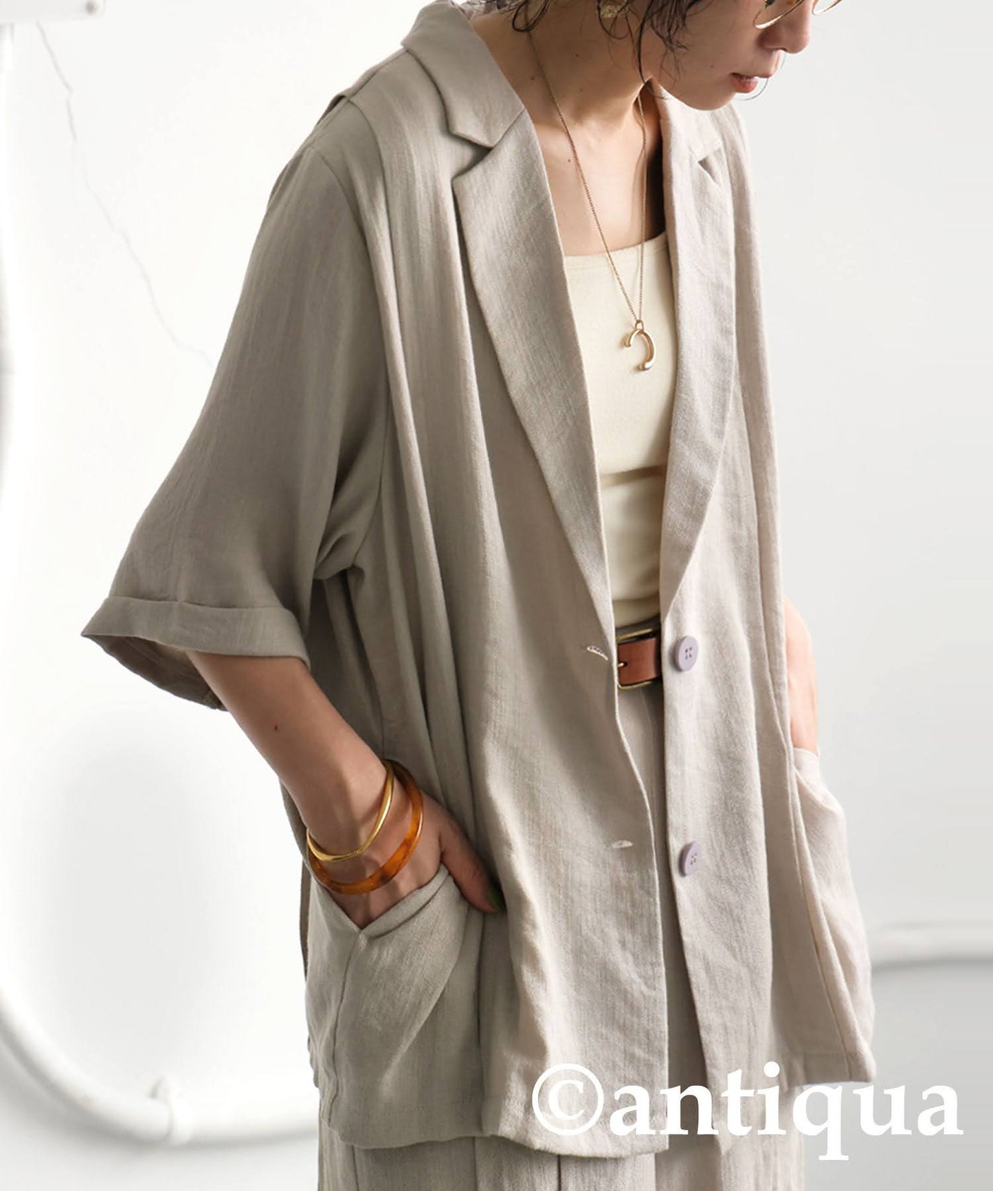 Ladies Tuck Short Sleeve Jacket