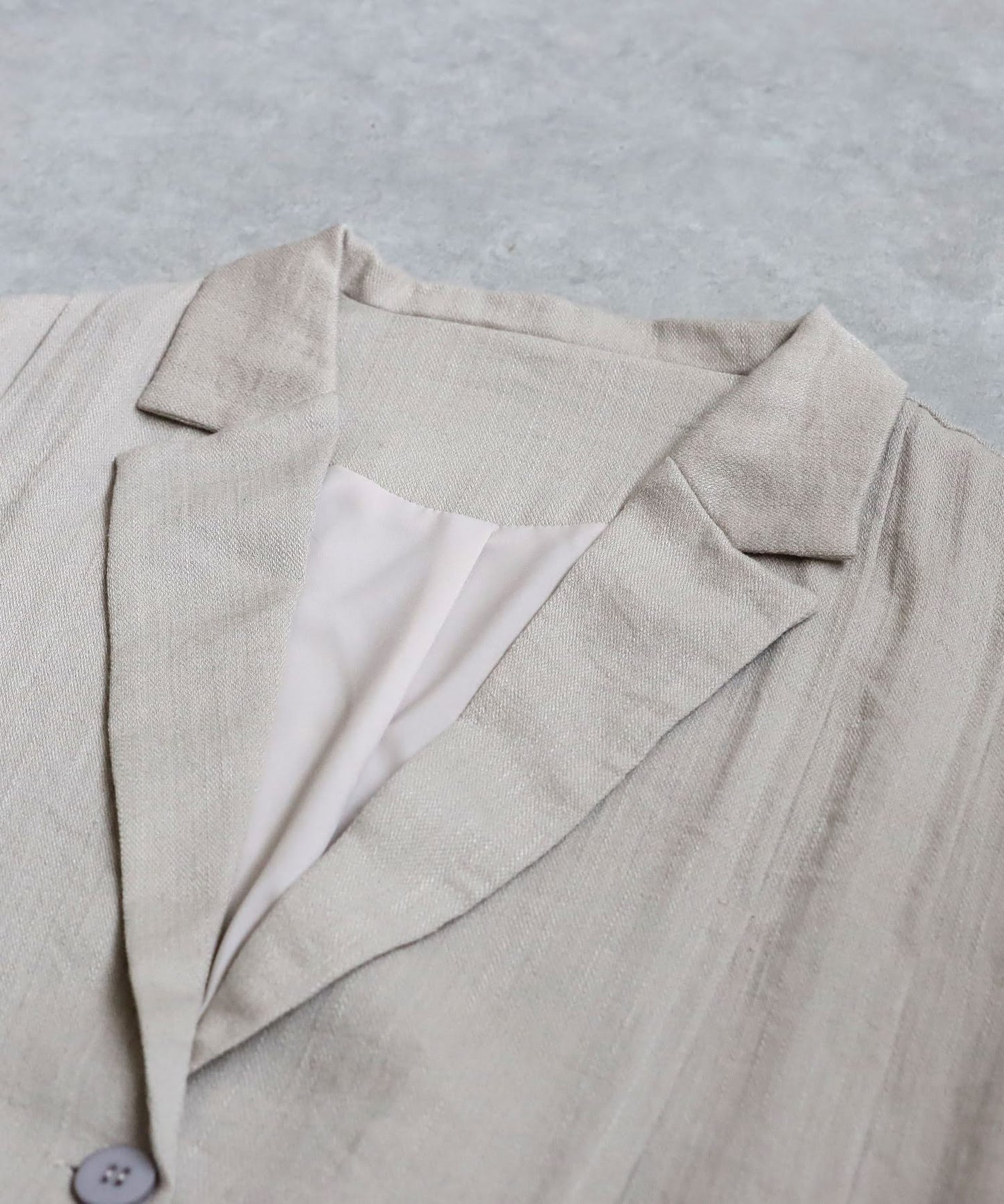 Ladies Tuck Short Sleeve Jacket