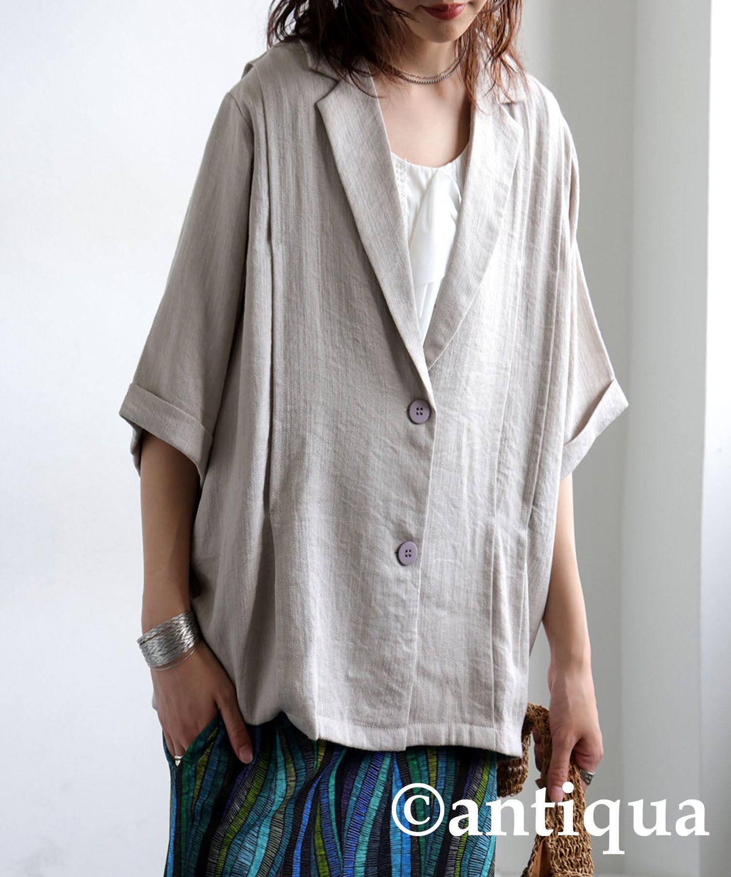 Ladies Tuck Short Sleeve Jacket