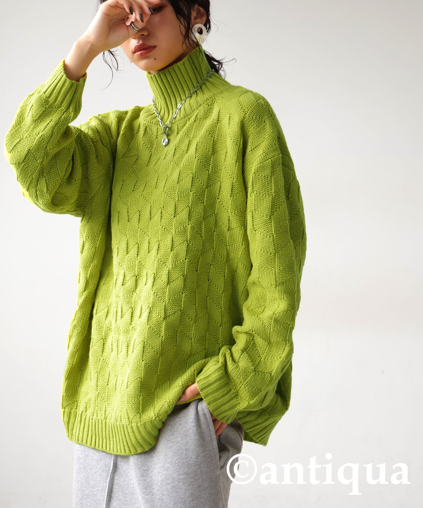 Parallelogram pattern high neck knit Ladies