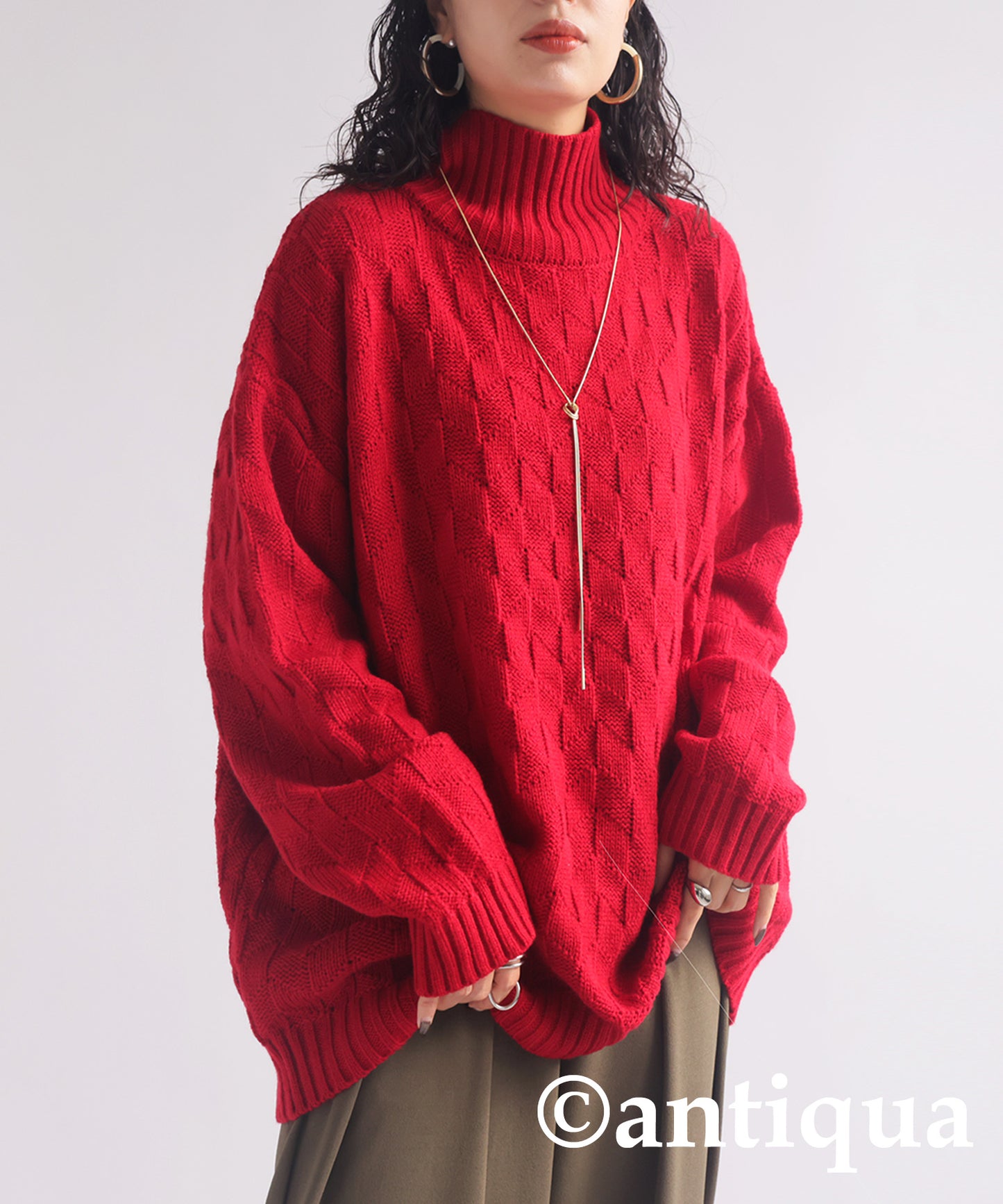 Parallelogram pattern high neck knit Ladies