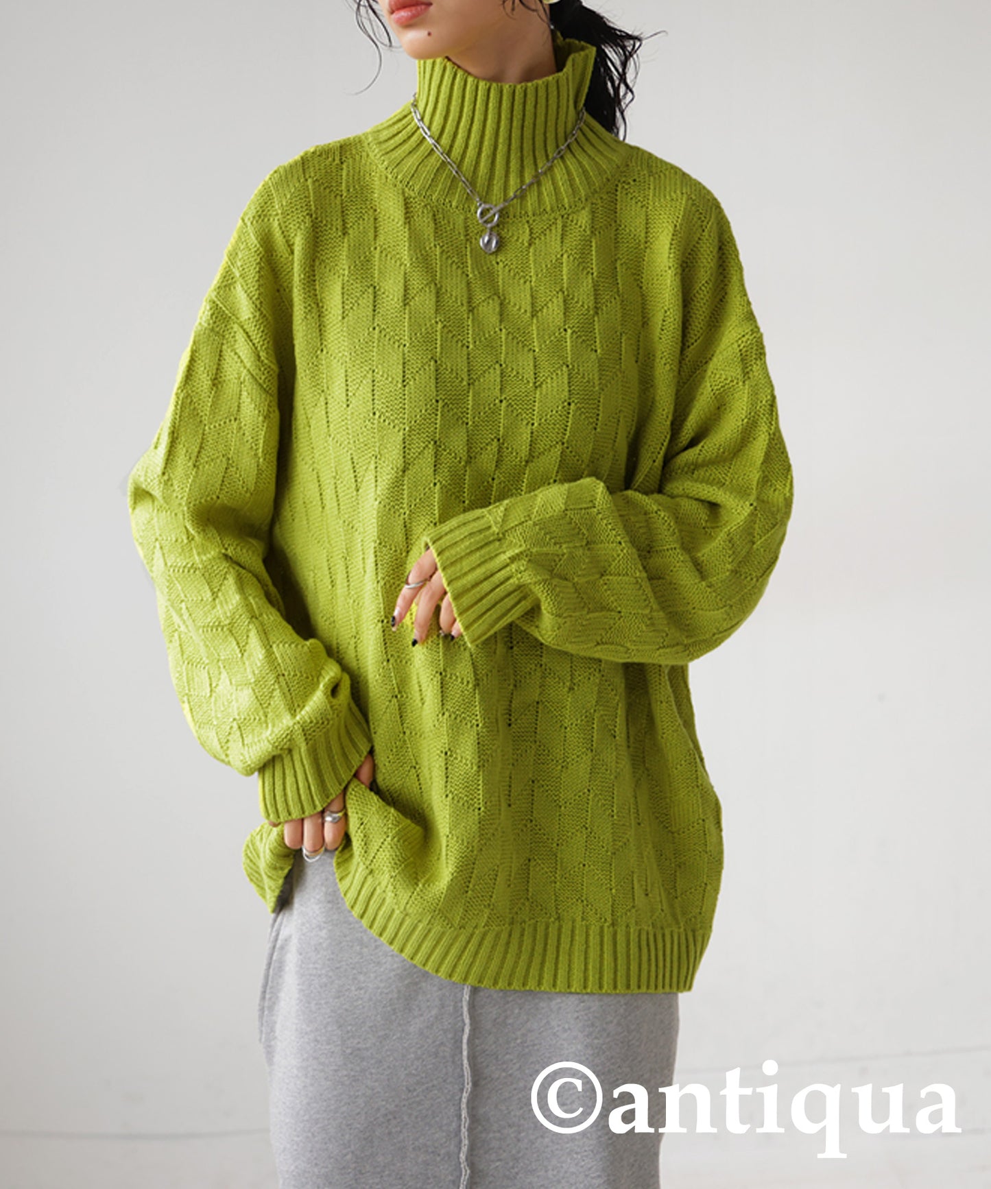 Parallelogram pattern high neck knit Ladies