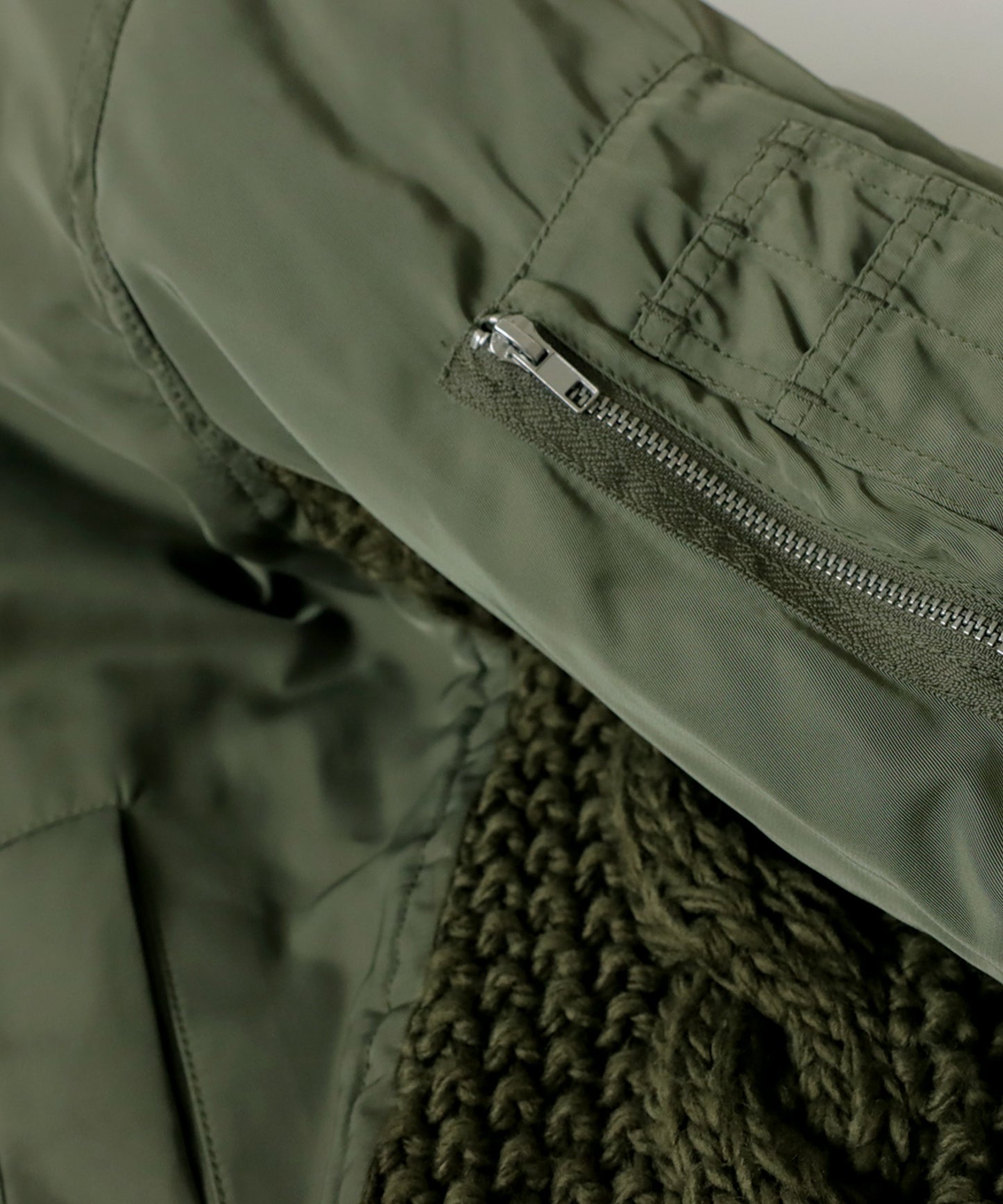 Layered like Men's quilting coat (MA-1) × cable knitting switchingdesign