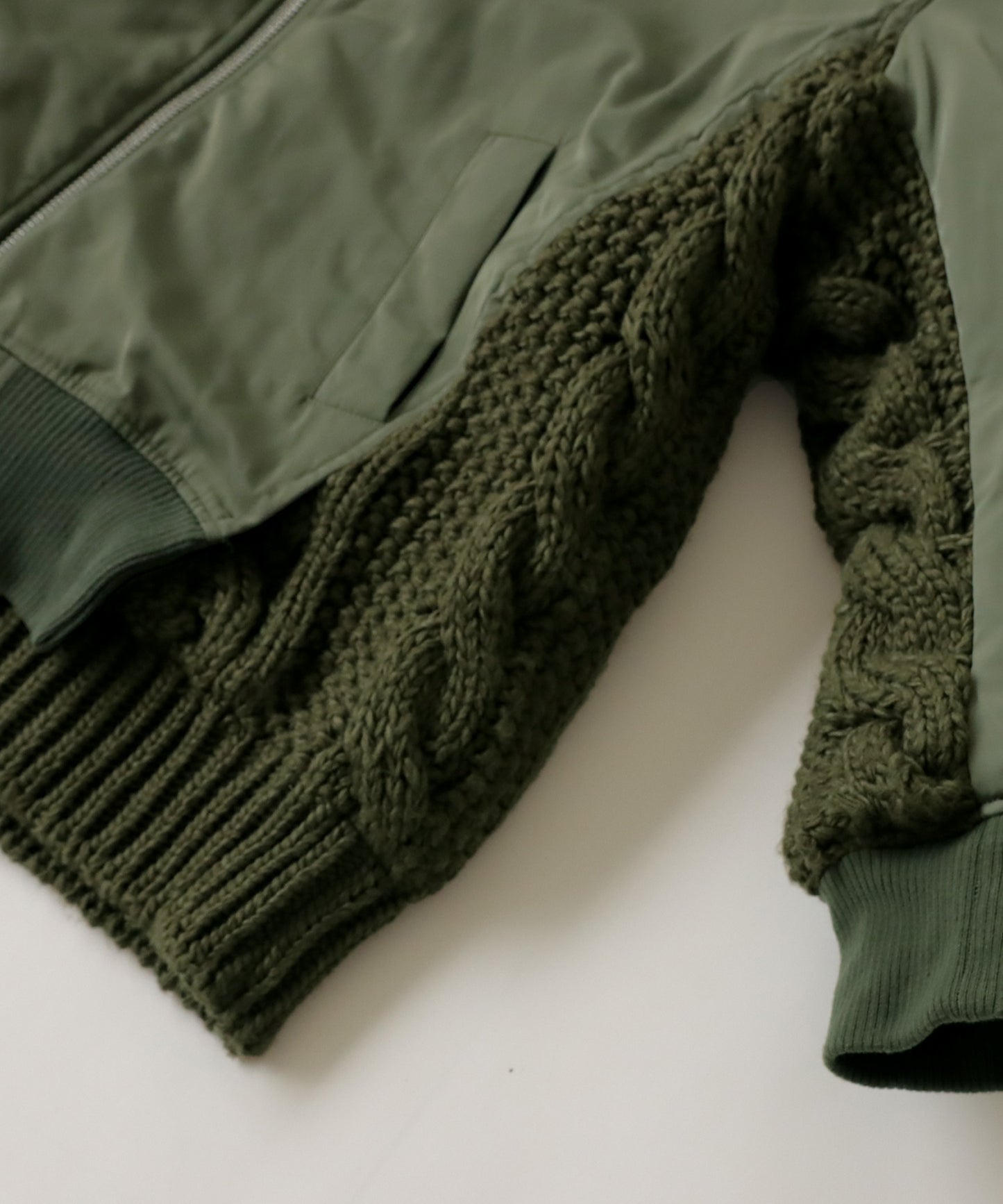 Layered like Men's quilting coat (MA-1) × cable knitting switchingdesign