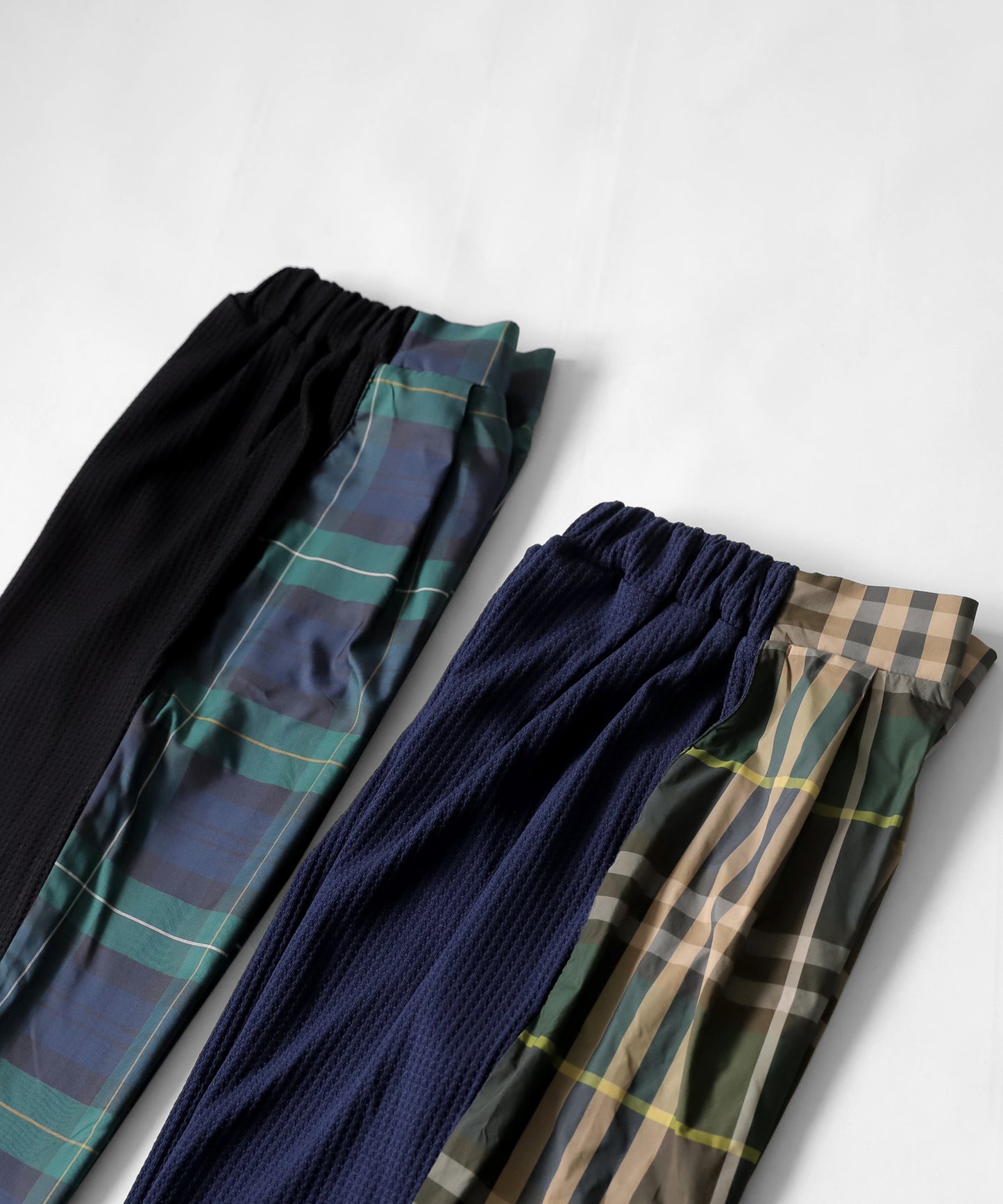 Different material switching check pants Men's