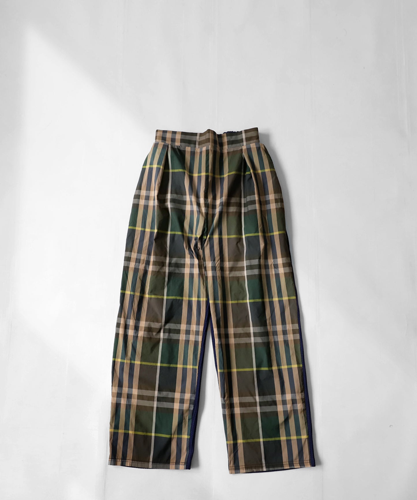 Different material switching check pants Men's