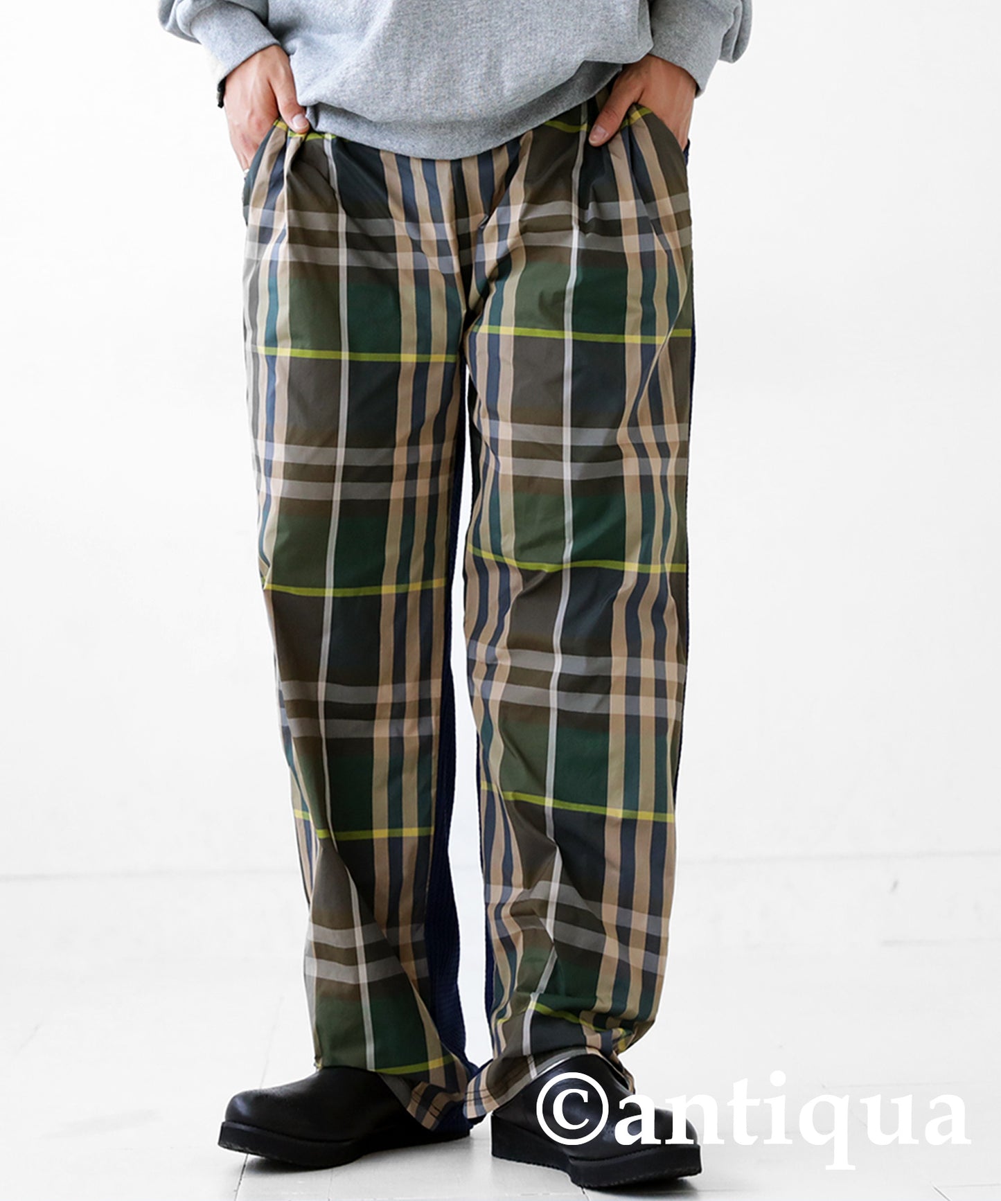 Different material switching check pants Men's