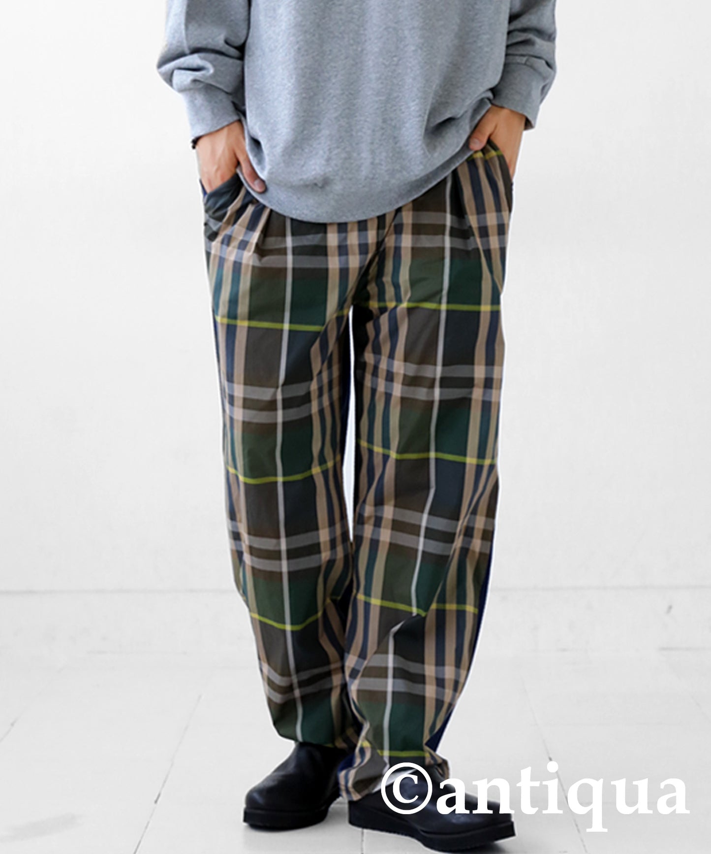 Different material switching check pants Men's