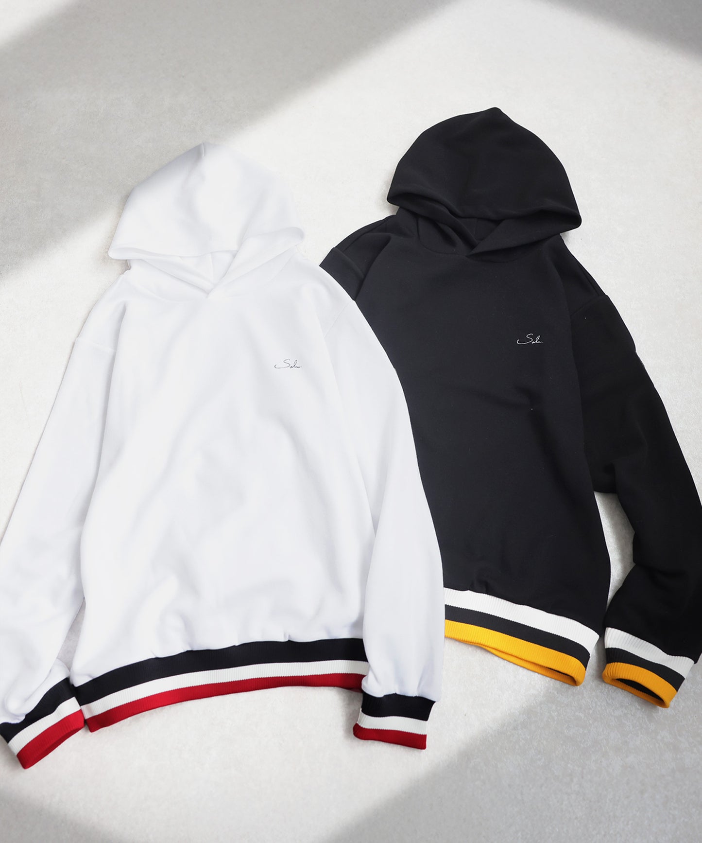ANTIQUA GOLF×STCH Color-Coordinated Line Ribbed Hoodie Men's
