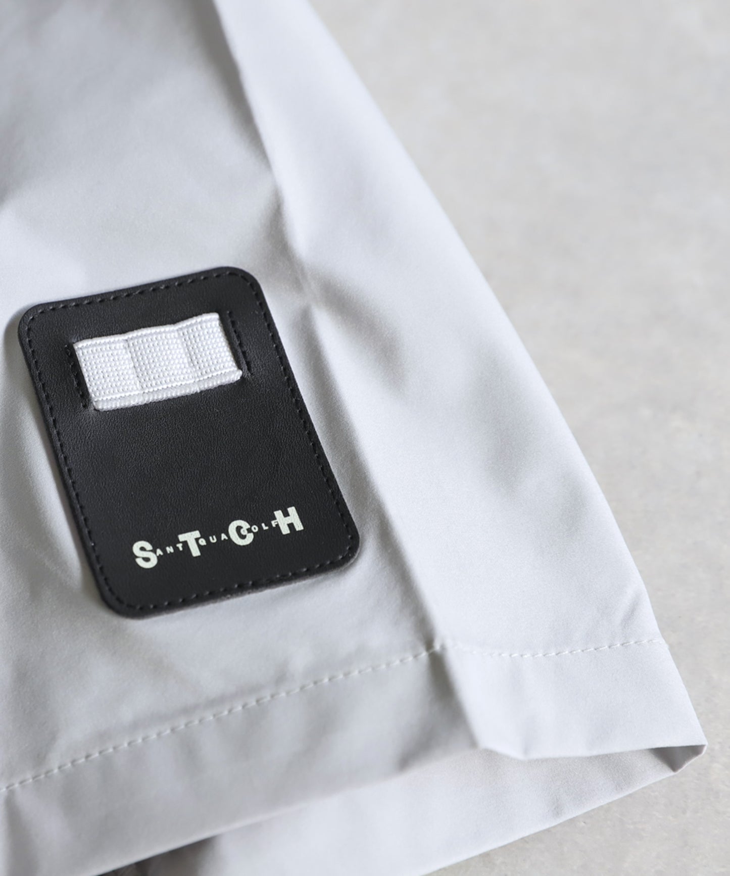 ANTIQUA GOLF×STCH Back Logo Tops Men's