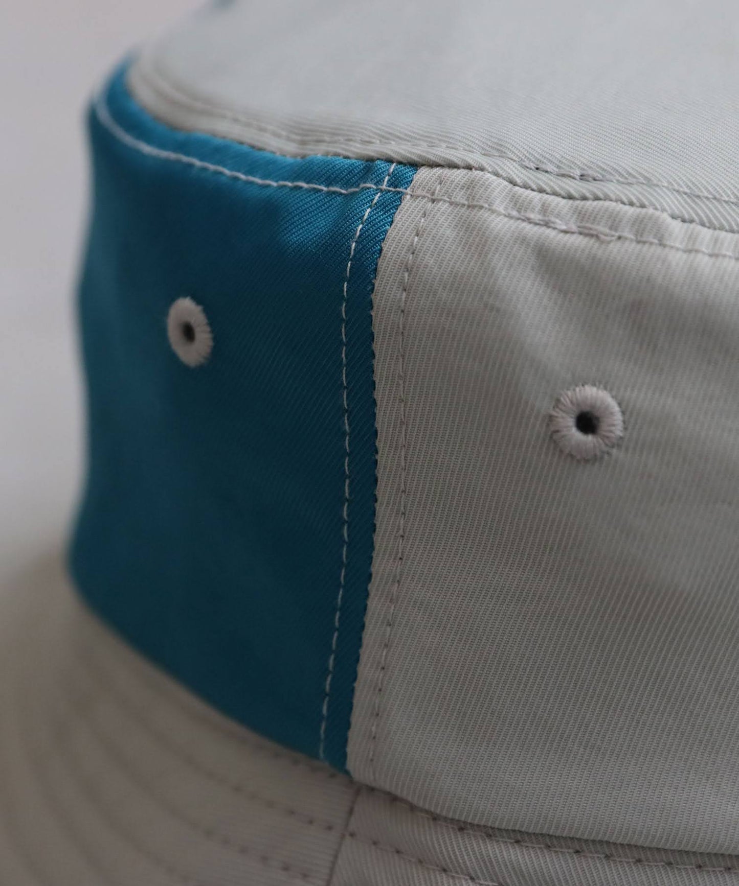 Ladies ANTIQUA GOLF × STCH Color-Coordinated Logo Bucket Hat