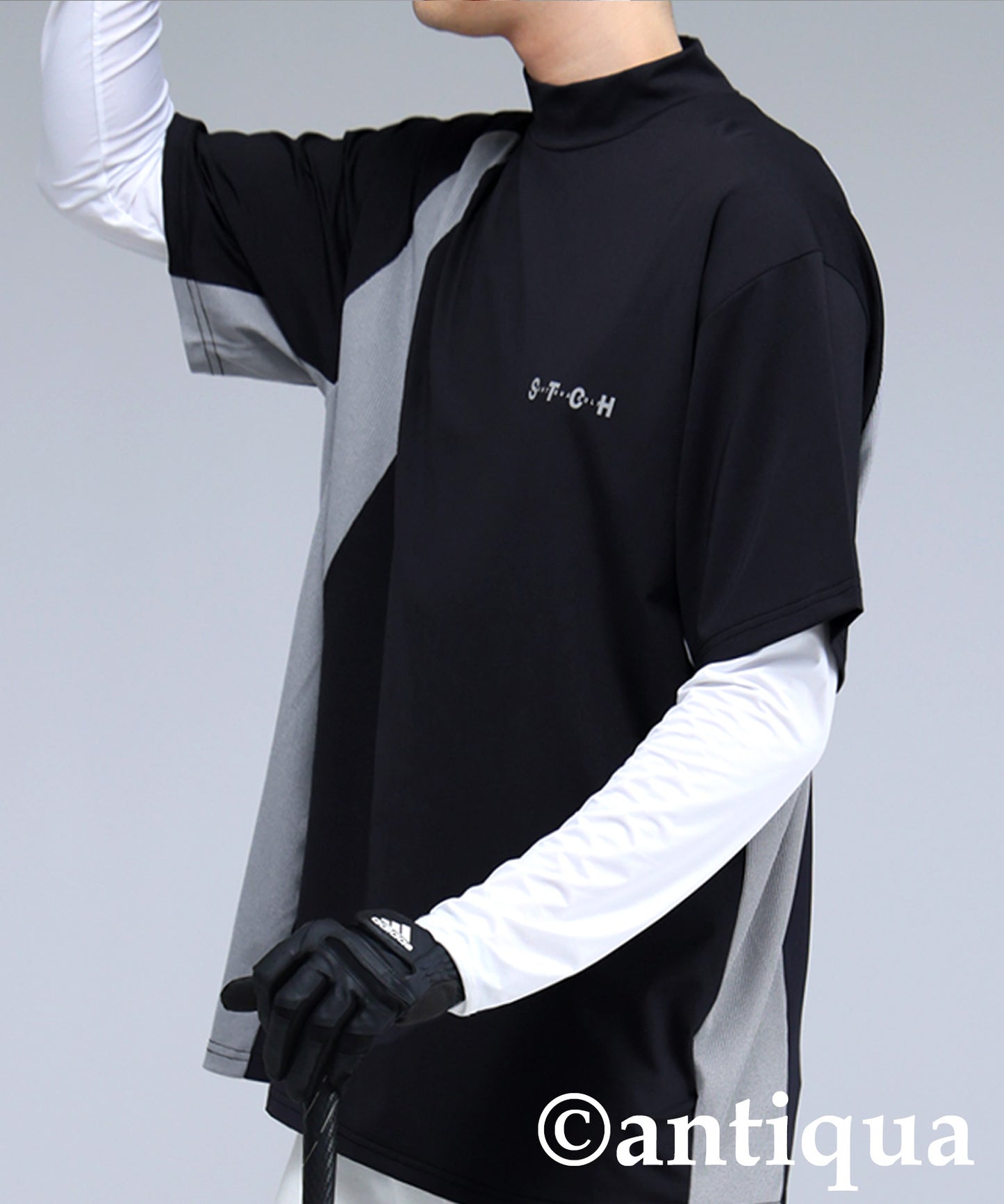 Men's ANTIQUA GOLF × STCH Asymmetric Logo Top