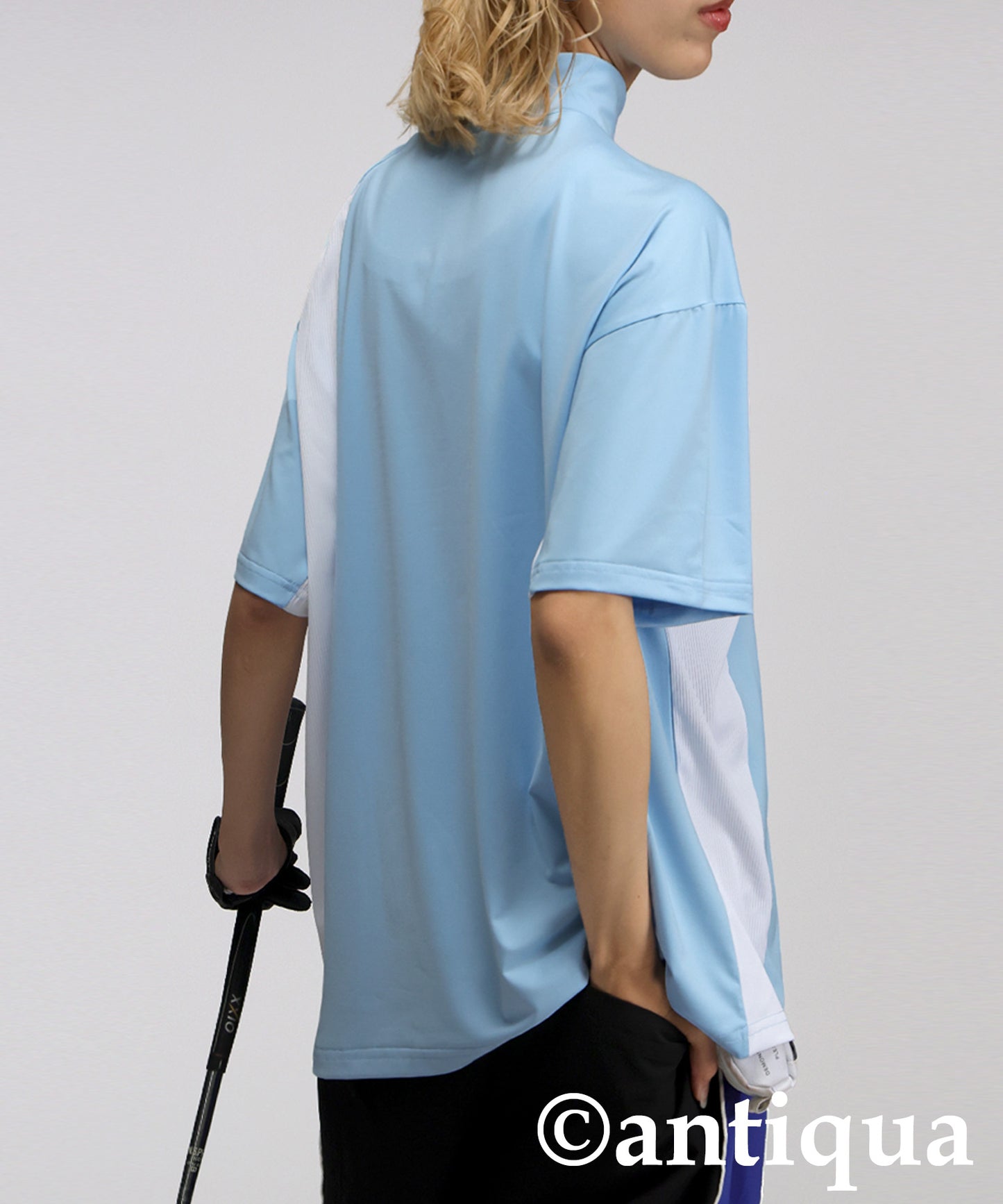 Ladies ANTIQUA GOLF × STCH Asymmetric Logo Top