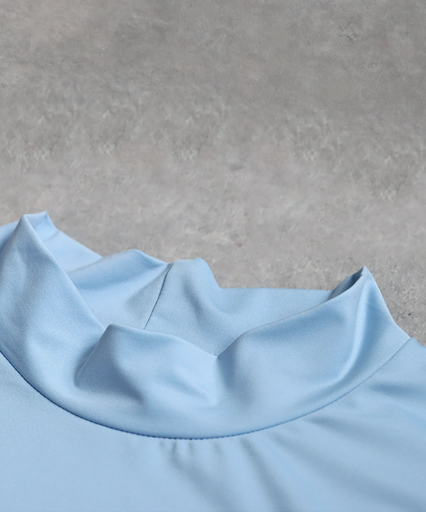 Ladies ANTIQUA GOLF × STCH Asymmetric Logo Top