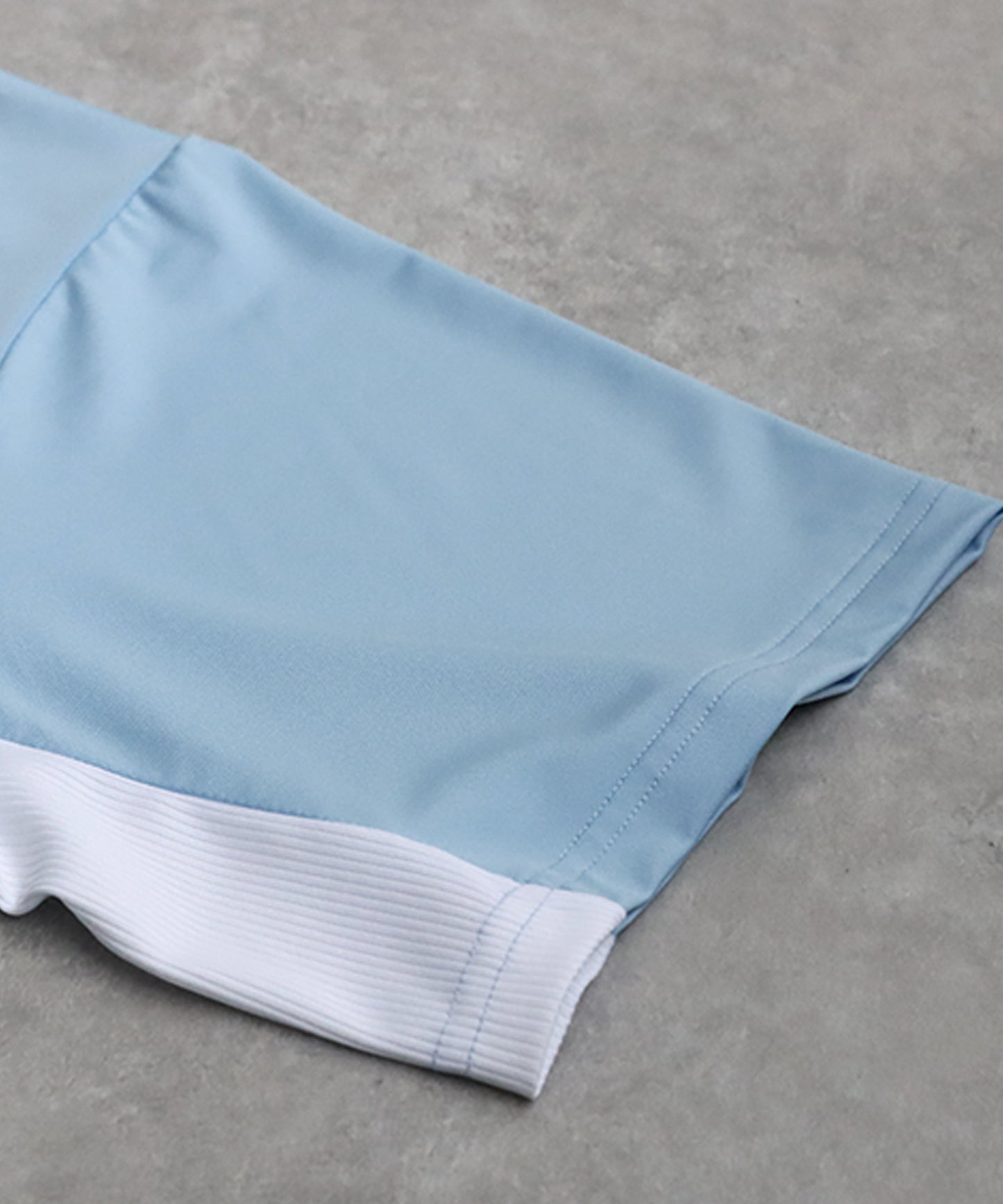 Men's ANTIQUA GOLF × STCH Asymmetric Logo Top