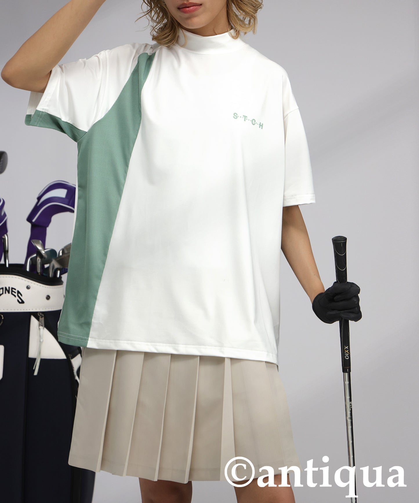 Ladies ANTIQUA GOLF × STCH Asymmetric Logo Top