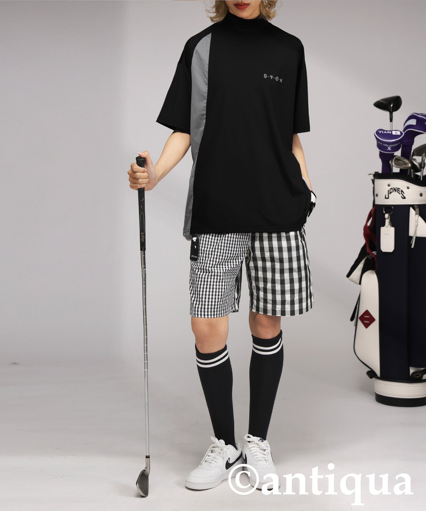 Ladies ANTIQUA GOLF × STCH Asymmetric Logo Top