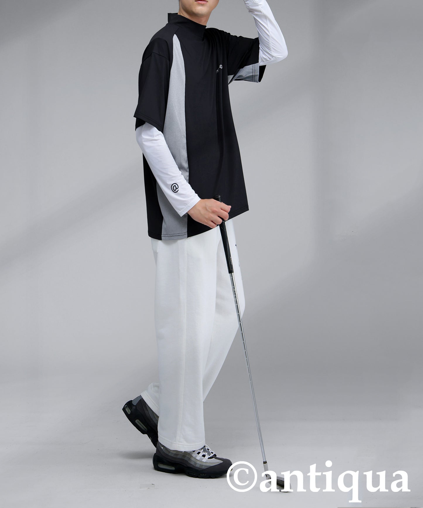 Men's ANTIQUA GOLF × STCH Asymmetric Logo Top