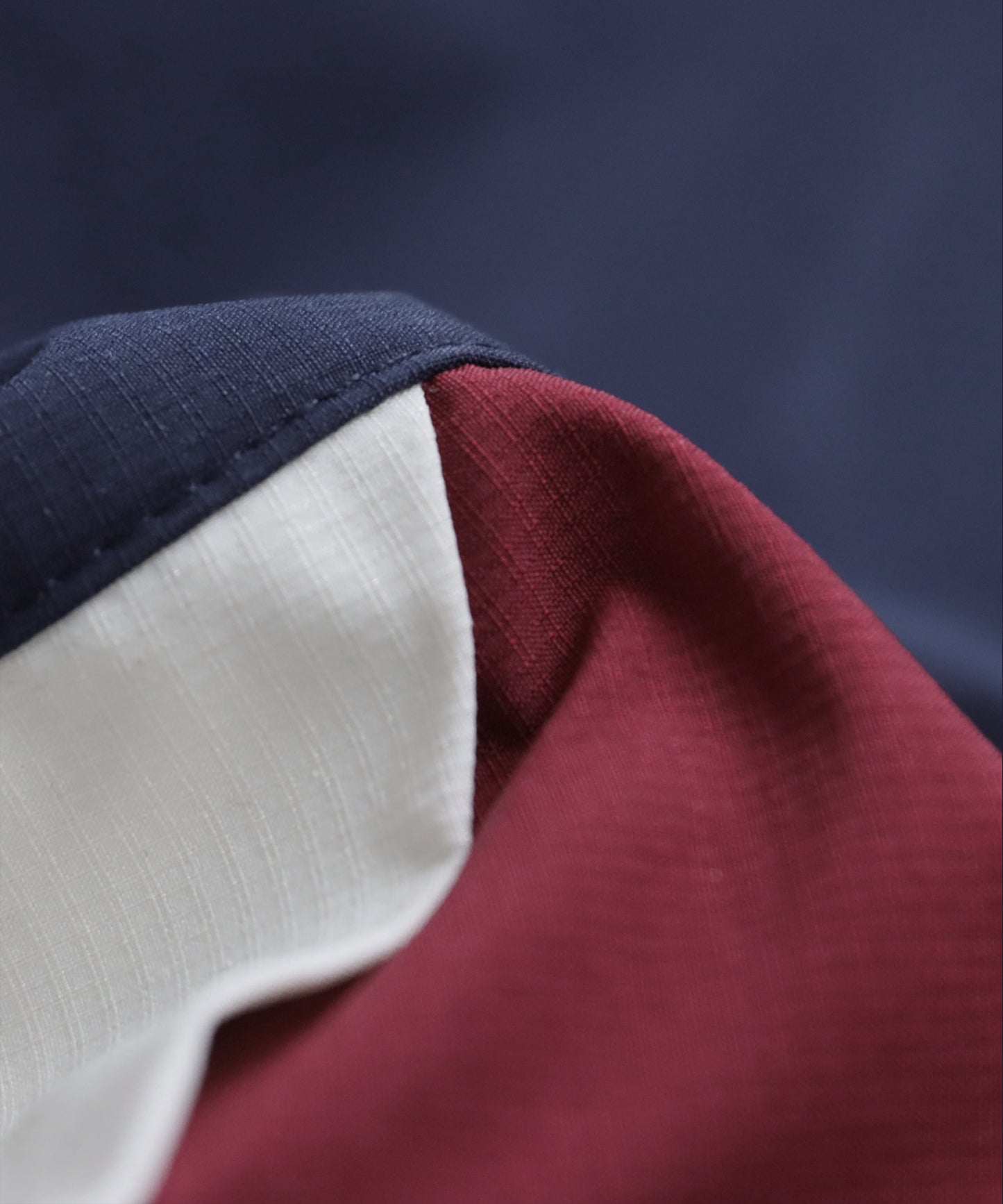 ANTIQUA GOLF×STCH Color-Blocked Tops Men's