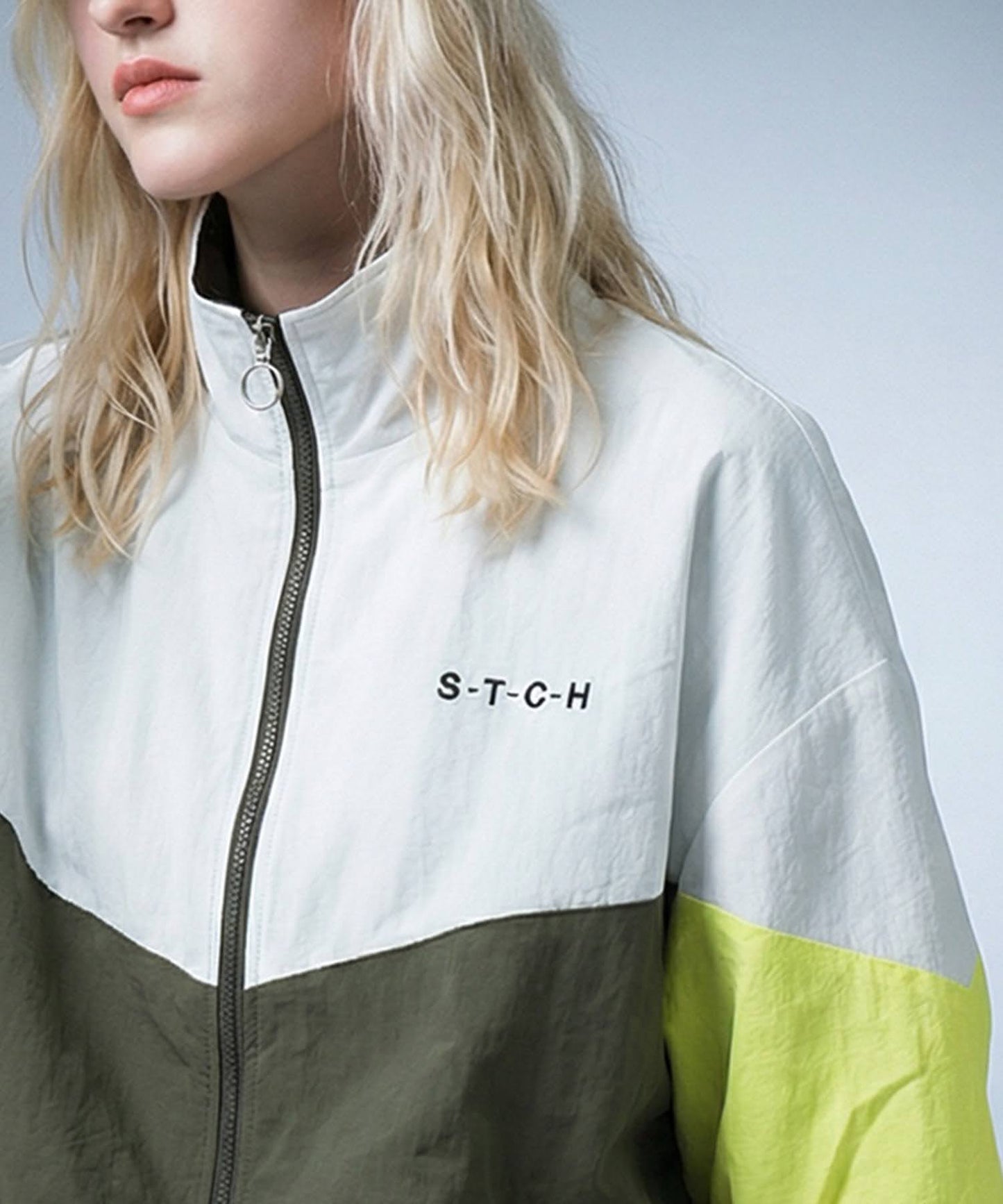 ANTIQUA GOLF×STCHStand Neck Color-Blocked Blouson Ladies