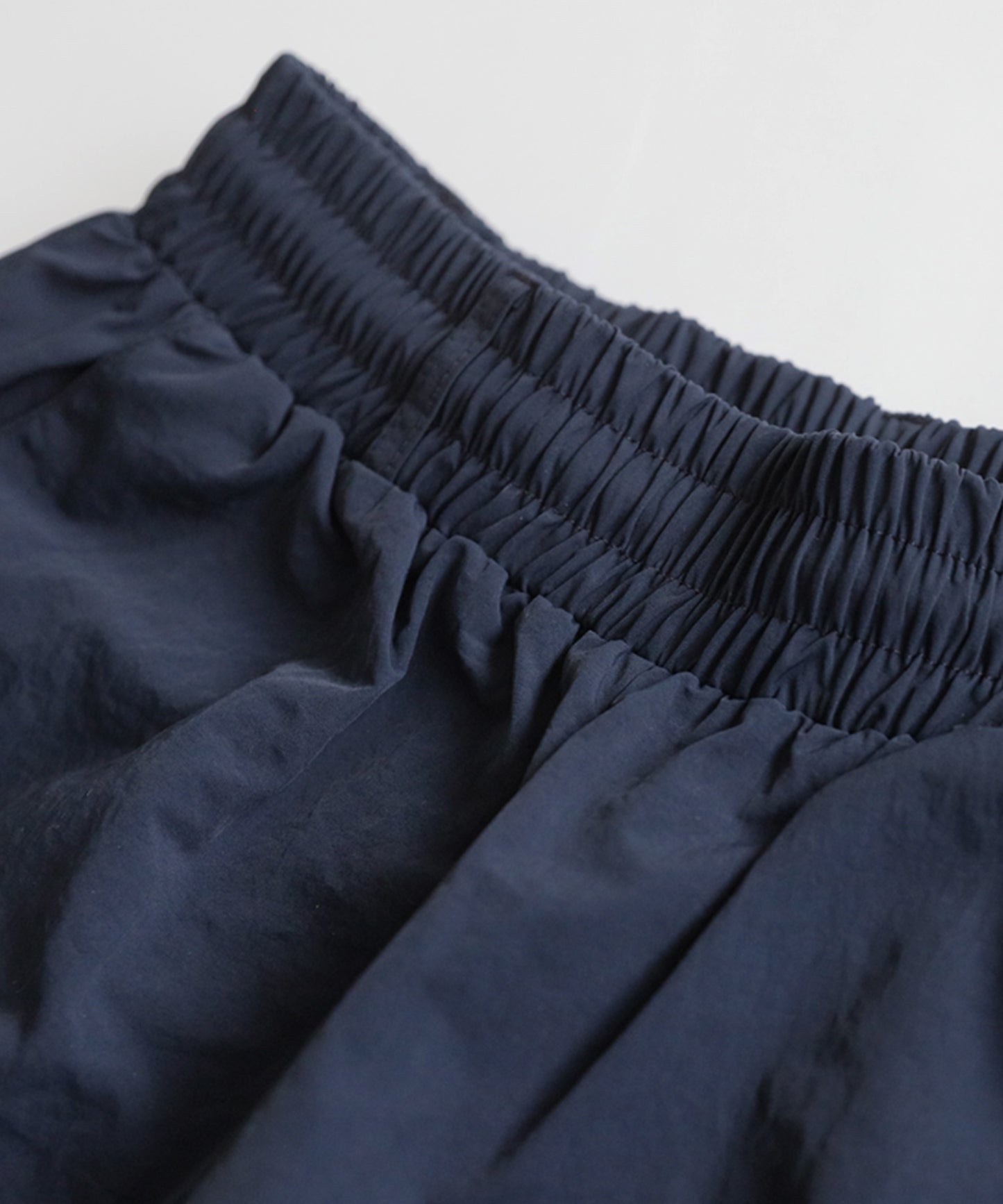 ANTIQUA GOLF×STCH 2-Way Color-Block Nylon Pants Ladies