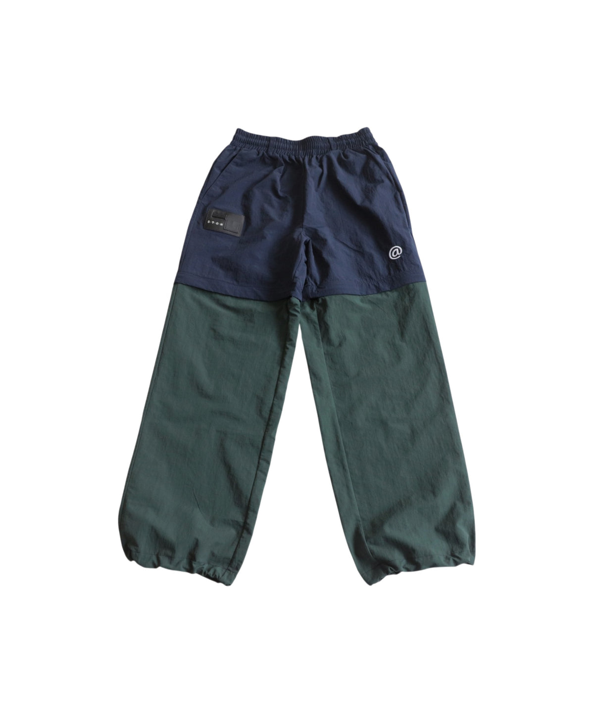 ANTIQUA GOLF×STCH 2-Way Color-Block Nylon Pants Men’s