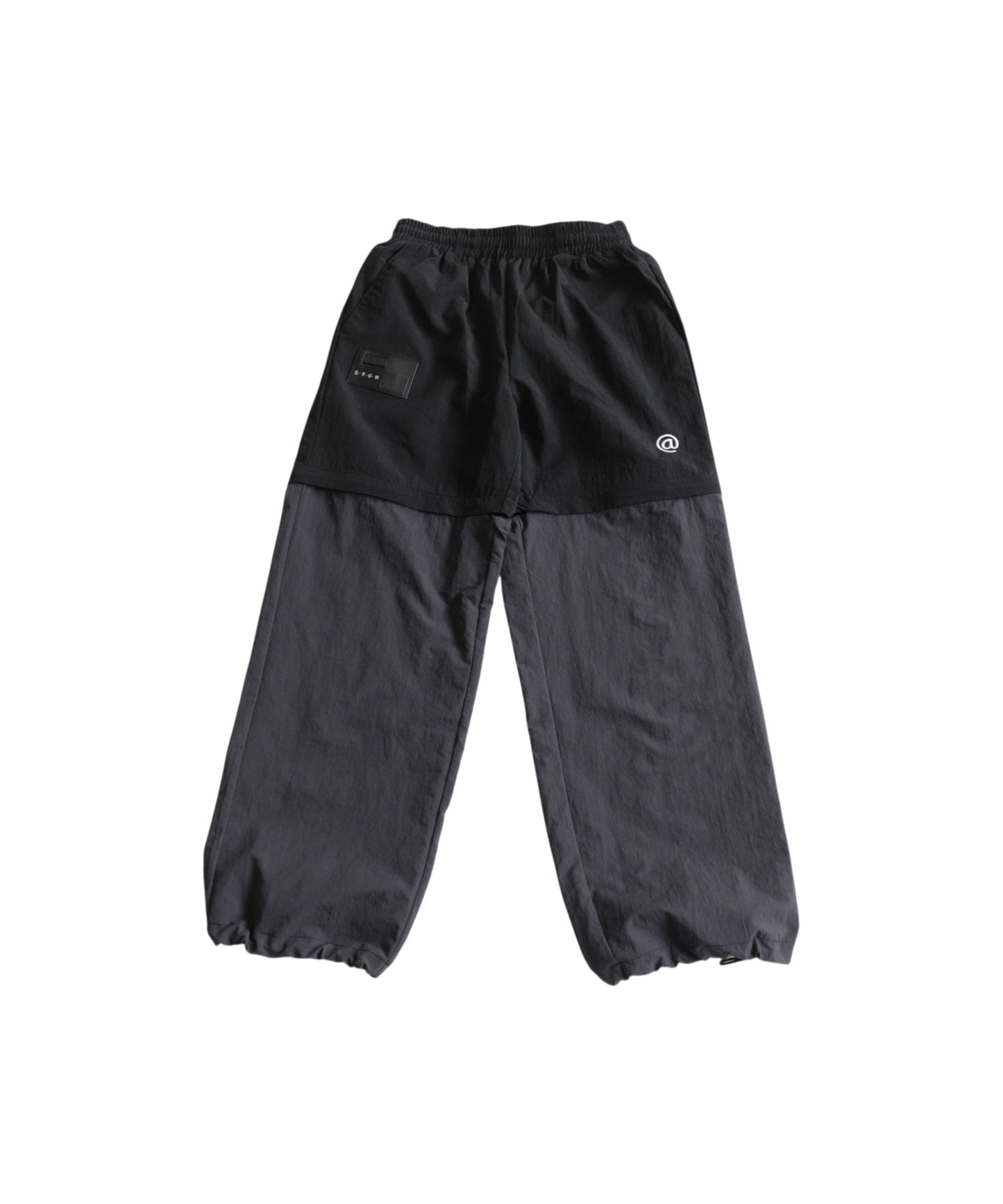 ANTIQUA GOLF×STCH 2-Way Color-Block Nylon Pants Men’s