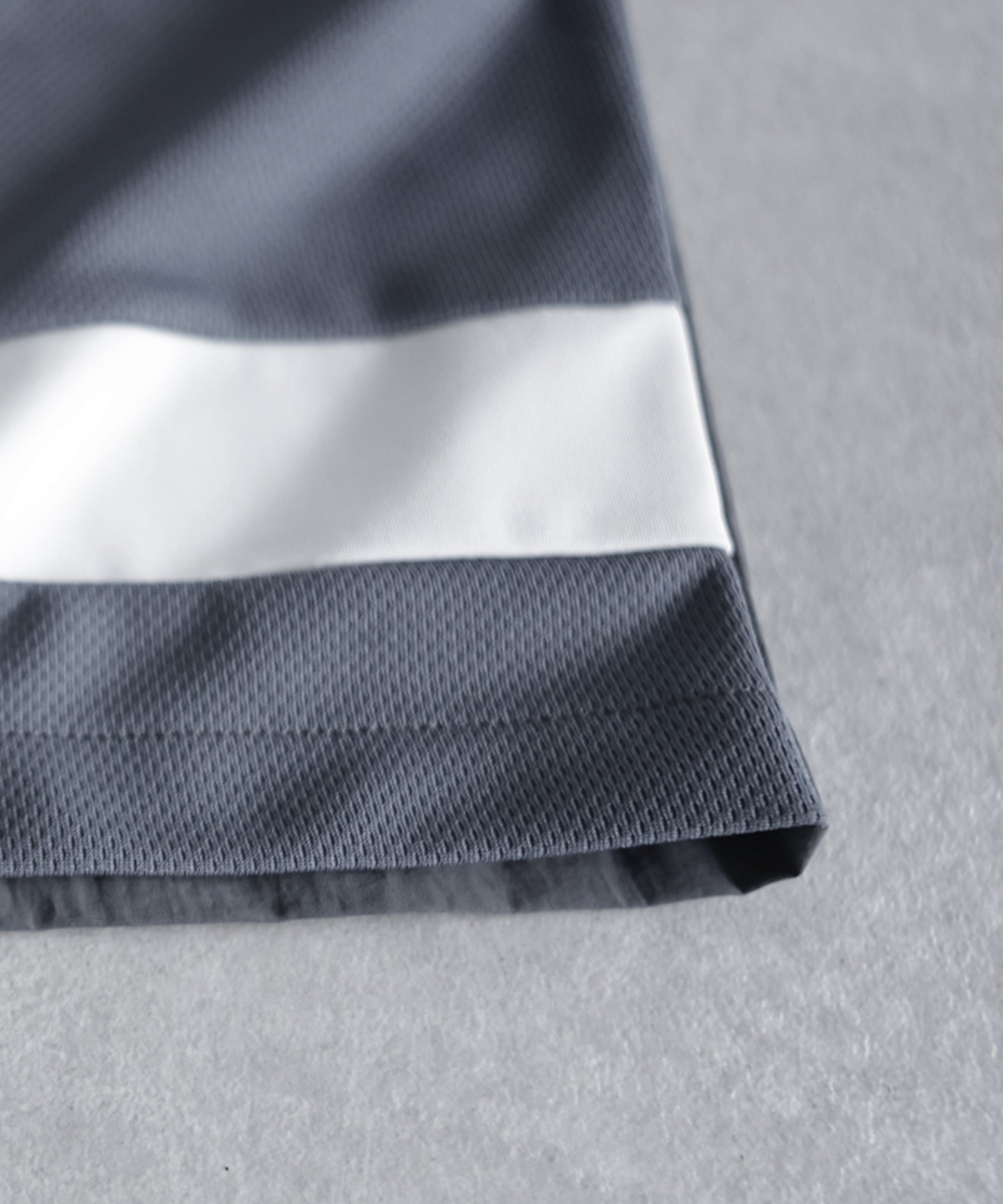 ANTIQUA GOLF×STCH Mixed-Material Mesh Logo Shorts Ladies