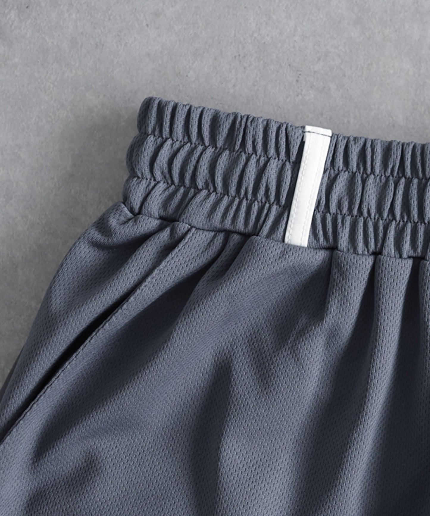 ANTIQUA GOLF×STCH Mixed-Material Mesh Logo Shorts Ladies